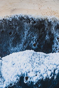 aerial view photography of sea waves thumbnail