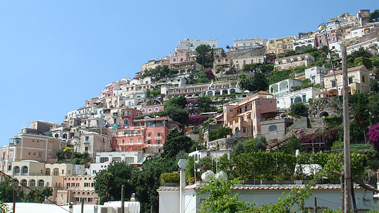 concrete houses on hill at daytime thumbnail
