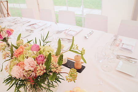 pink roses and green Hydrangea flowers centerpiece on table thumbnail