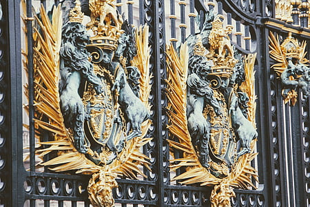 gold, gray, and black metal gate thumbnail