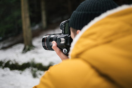 man taking photo during daytime thumbnail