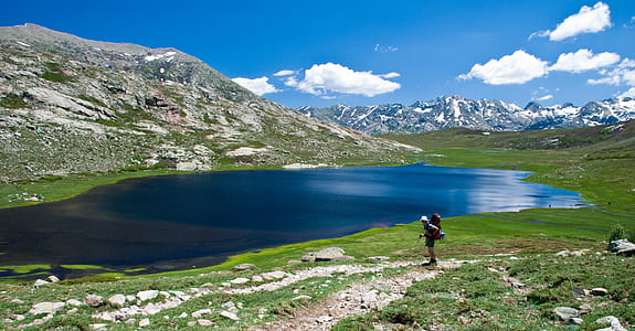lake in the middle of mountains thumbnail