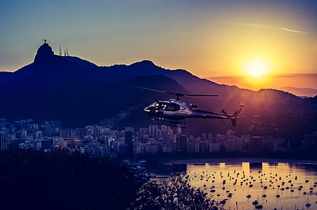 Aerial Photography of Helicopter during Twilight thumbnail