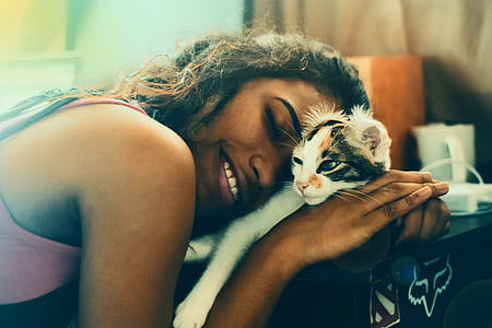woman holding white cat thumbnail