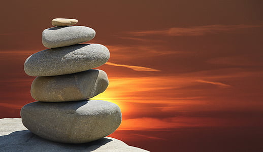 stack of gray stones during golden hour thumbnail