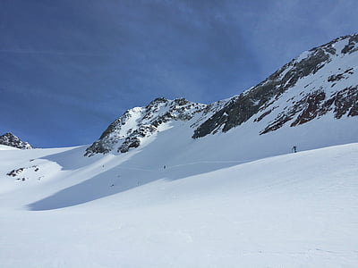 low angle photo of mountain range covered with snow thumbnail