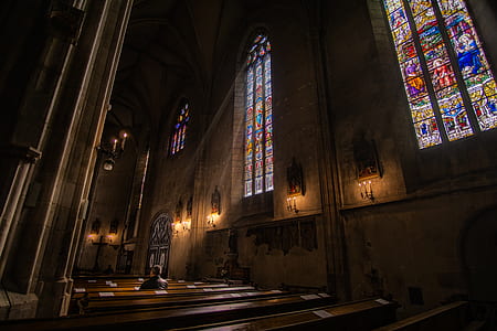 man sitting inside cathedral thumbnail