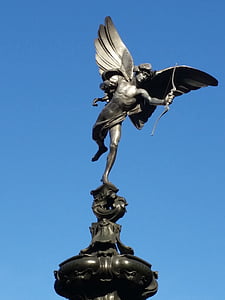 man with wings holding bow statue thumbnail
