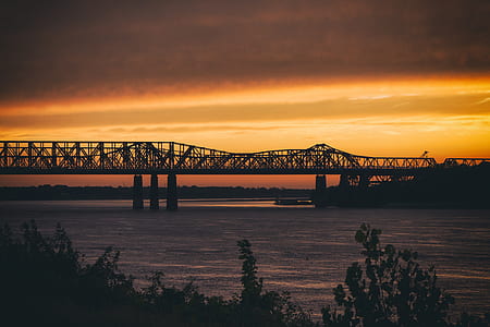 silhouette photography of a suspension bridge thumbnail
