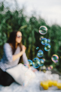 Having fun with soap bubbles in the nature thumbnail