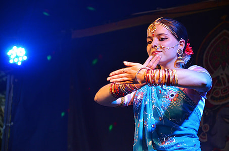 woman doing dancing pose under stage thumbnail