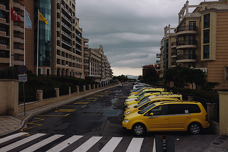 Parked Yellow Taxi Cab Waiting for a Fare thumbnail
