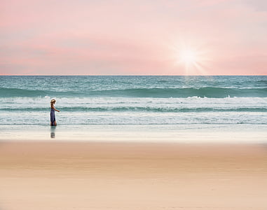 man standing beside body of water thumbnail