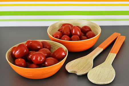 two orange bowls and ladles thumbnail