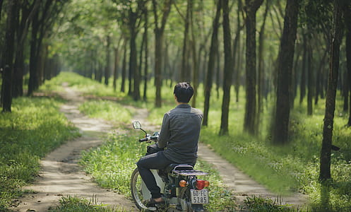 Man Riding A Moped thumbnail