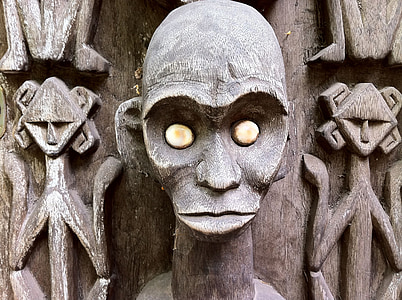 brown wooden sculpted statue thumbnail