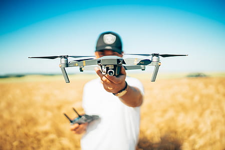 shallow focus photography of quad copter drone thumbnail
