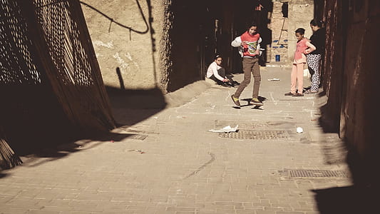 three person dancing on street thumbnail