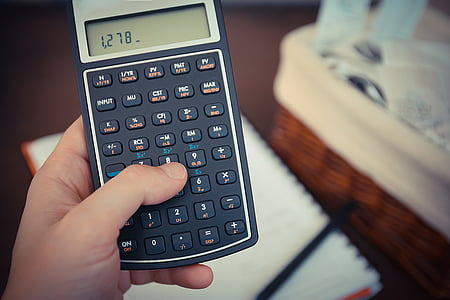 person holding black calculator thumbnail