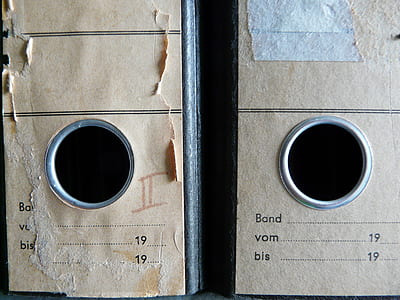 two brown-and-gray boxes closeup photography thumbnail