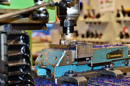 blue and gray bench vise on table thumbnail