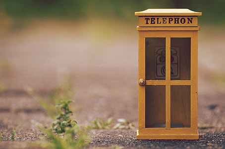 brown Telephon booth at daytime thumbnail
