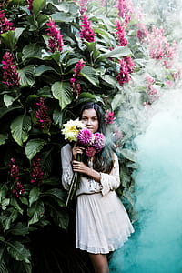 woman holding flowers thumbnail