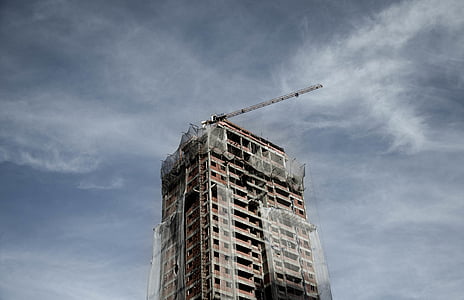 brown and white concrete building thumbnail