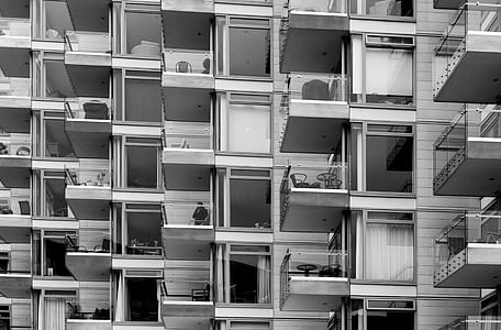 scale grey photo of glass building thumbnail