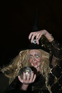 witch doll holding crystal ball thumbnail