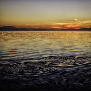 body on water during sunset thumbnail