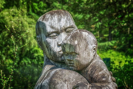 human and child gray statue thumbnail
