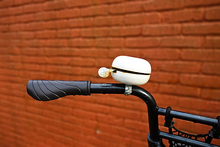 selective focus photography of bike bel thumbnail