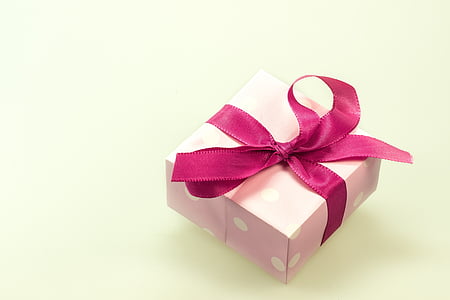 pink and white polka-dot gift box with pink ribbon thumbnail