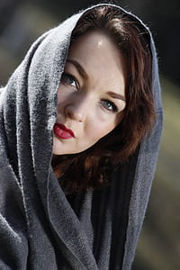 woman wearing gray scarf thumbnail