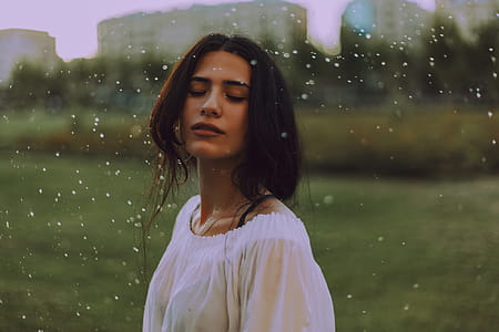 Woman in White Shirt With Green Background thumbnail