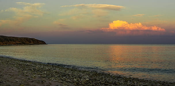 seashore under blue sky thumbnail