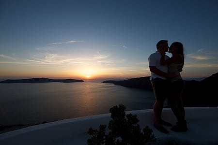 man and man holding each other during sunset thumbnail