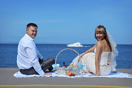 bride and groom on the beach thumbnail