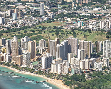 aerial view of buildings near sea thumbnail