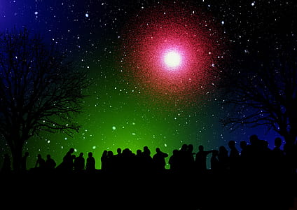 silhouette of people standing under moon thumbnail
