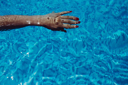 Blue ripped water in swimming pool thumbnail