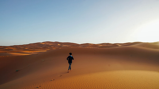 person running on desert thumbnail