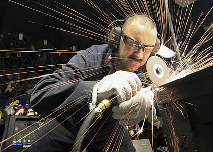 man using a power tool thumbnail