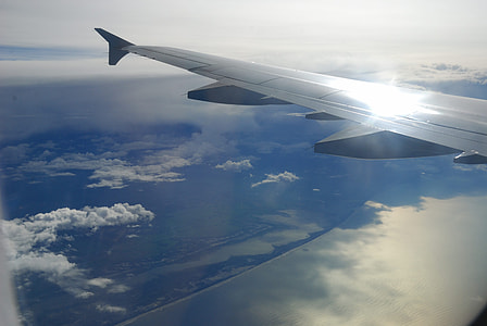 aerial photography of airplane flying above the sky thumbnail