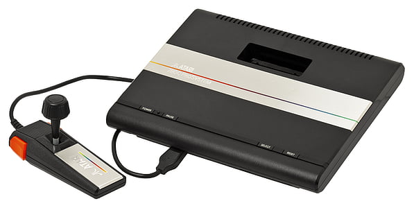 black and gray Atari console with controller thumbnail