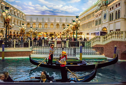 woman standing in black gondola thumbnail