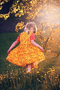 toddler girl in yellow floral dress thumbnail