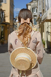 woman in beige long-sleeved dress thumbnail