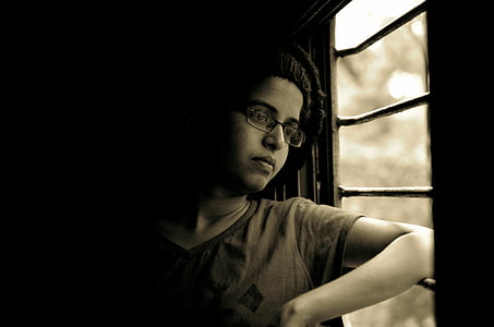 woman lean on window thumbnail